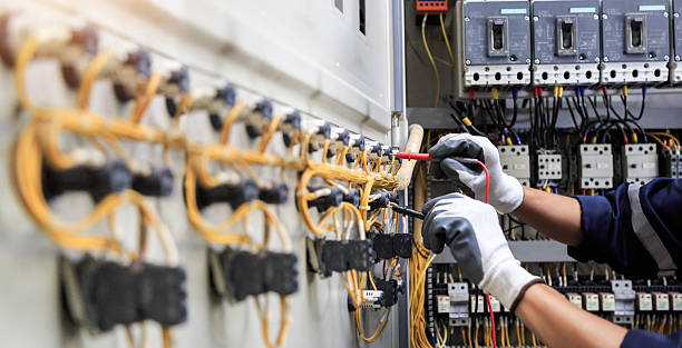 Professional Electrician technician working in Biscayne Park, FL